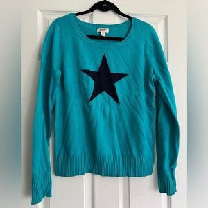 Arizona Jean Co. blue sweater with navy blue star. Size XL.